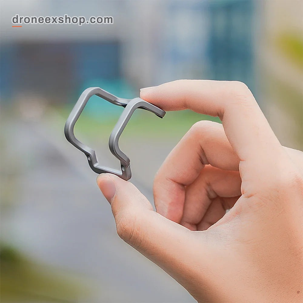DJI Neo gimbal bumper held in the hand, lightweight metal frame